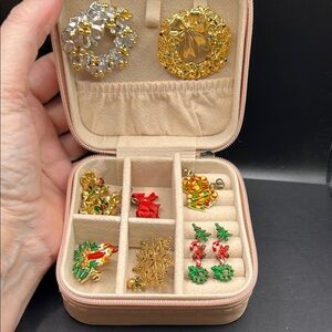 Nice lot of vintage holiday jewelry in new travel case. Three pins, bracelet etc